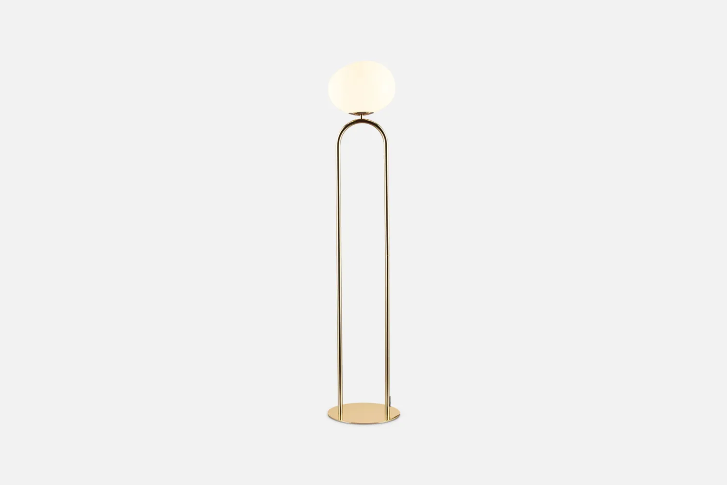 Glass and Brass Floor Lamp: Modern brass floor lamp with a white opal glass shade, minimalist and elegant design for contemporary living spaces.
