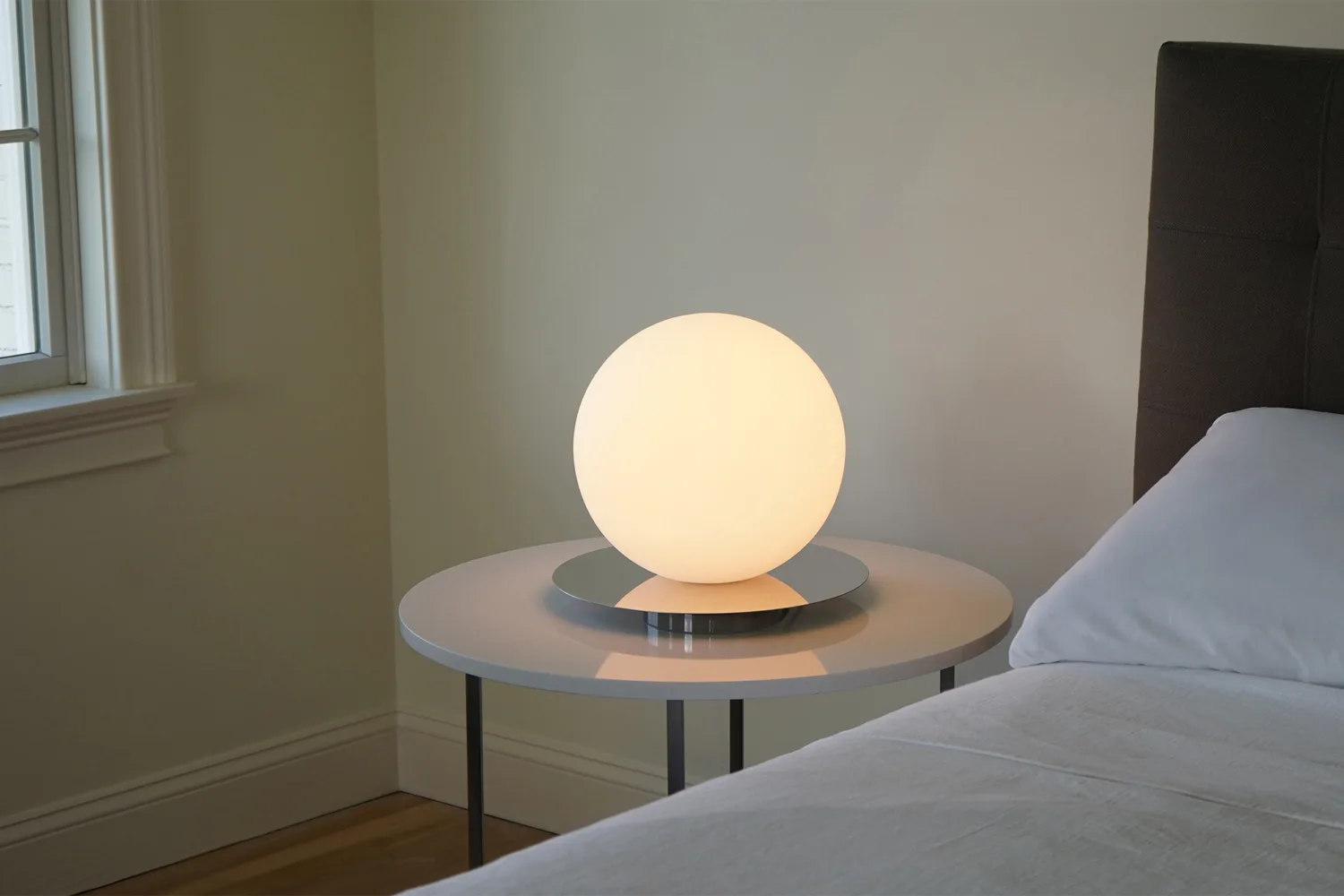 Pablo Bola Sphere Table Lamp - Modern minimalist white glass globe lamp on a chrome base for contemporary living spaces.