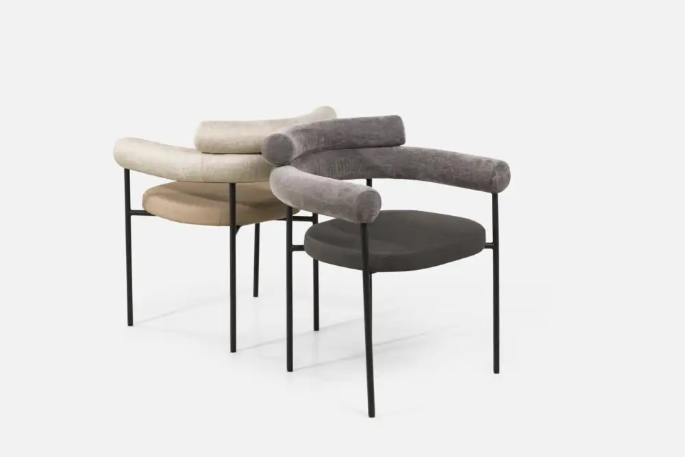 Bradfords modern dining chair with wraparound upholstered backrest, cushioned seat, and slim black metal legs – contemporary furniture for stylish dining rooms