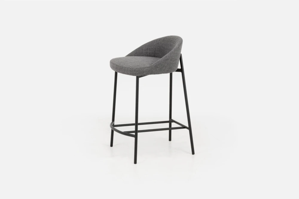 Bradfords MICK barstool in graphite vintage PU leather with a curved backrest and black metal legs, offering contemporary style and comfort for modern dining spaces.
