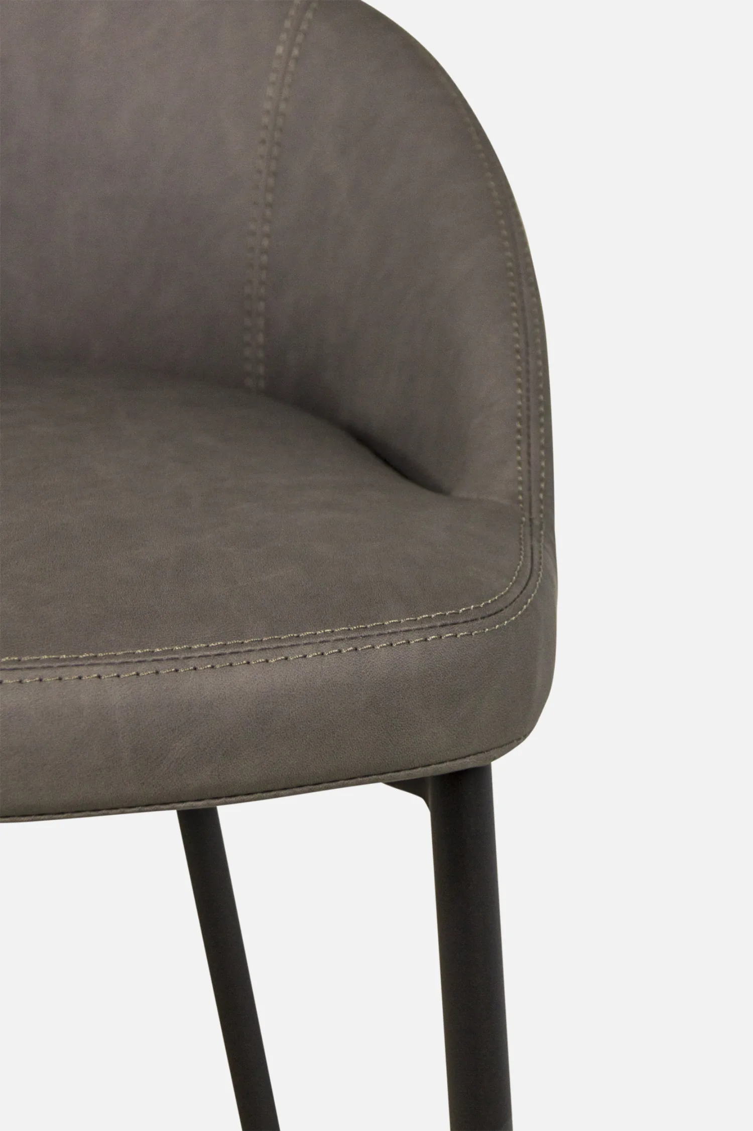 Bradfords MICK barstoolr with a curved backrest and black metal legs, offering contemporary style and comfort for modern dining spaces.