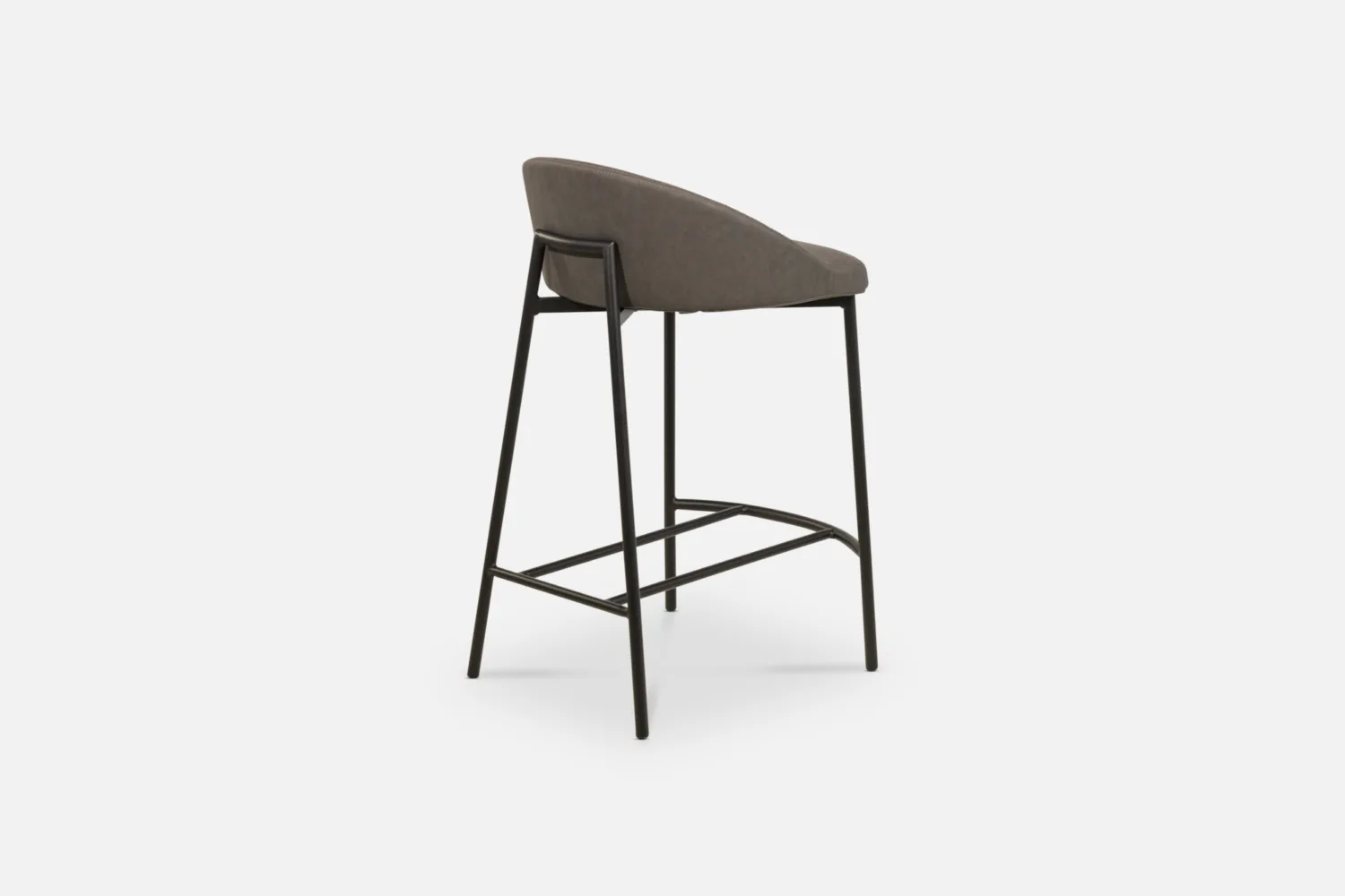 Bradfords MICK barstool in graphite vintage PU leather with a curved backrest and black metal legs, offering contemporary style and comfort for modern dining spaces.