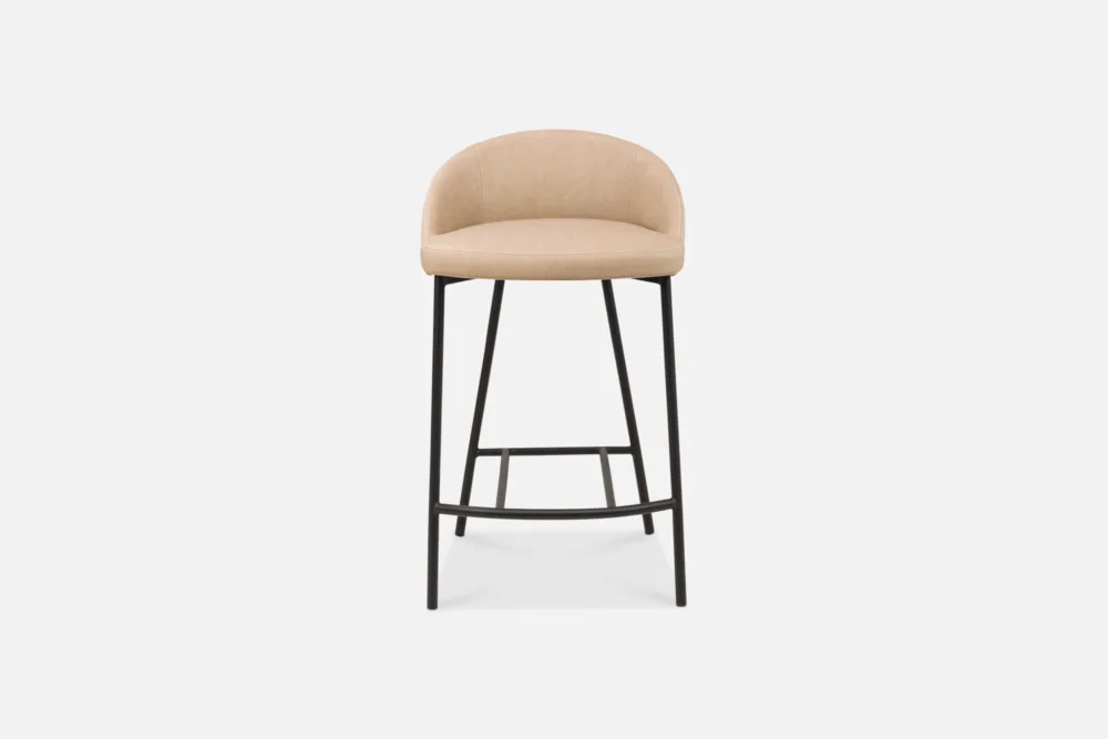 Bradfords MICK barstool in graphite vintage PU leather with a curved backrest and black metal legs, offering contemporary style and comfort for modern dining spaces.