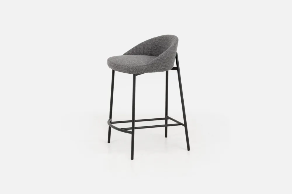 Bradfords MICK barstool in graphite vintage PU leather with a curved backrest and black metal legs, offering contemporary style and comfort for modern dining spaces.