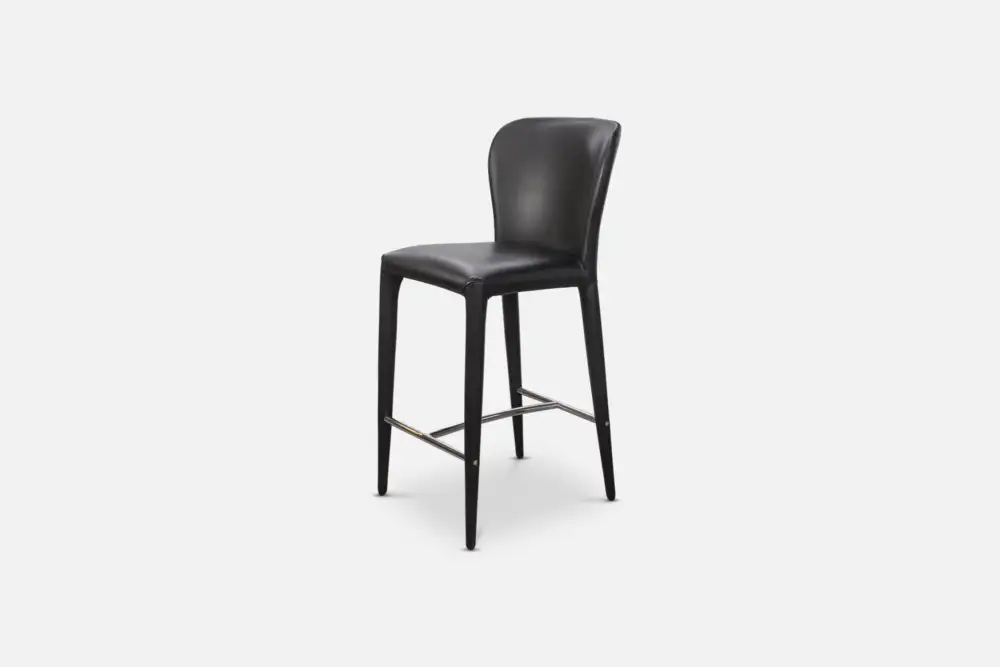 PU Barstool: Black sleek PU barstool, provides a stylish and affordable seating solution for your dining area. Discover our PU leather seating options at Bradfords, Auckland, New Zealand. Upholstered with cross stitch detail.