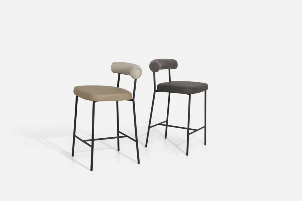 “Bradfords contemporary barstool with curved upholstered backrest, padded seat, and slender black metal frame – modern seating for kitchen islands and breakfast bar