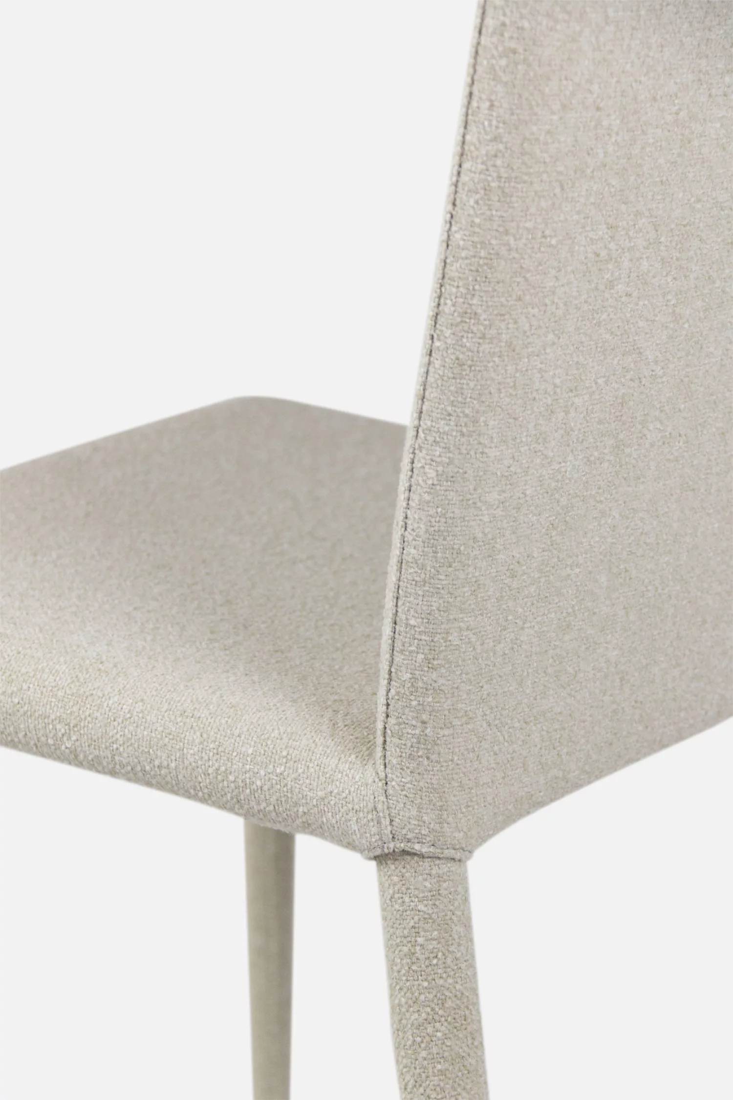 Chic beige dining chair, exudes understated elegance and versatility. Find your perfect neutral seating option at Bradfords, Auckland, New Zealand.