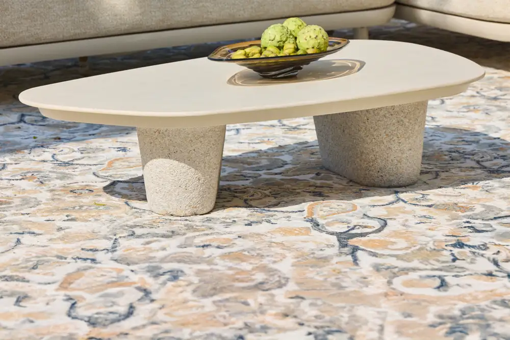 PURO coffee table with smooth stone top and sculpted base for a bold, contemporary look. Outdoor coffee tables available at Bradfords in Auckland New Zealand