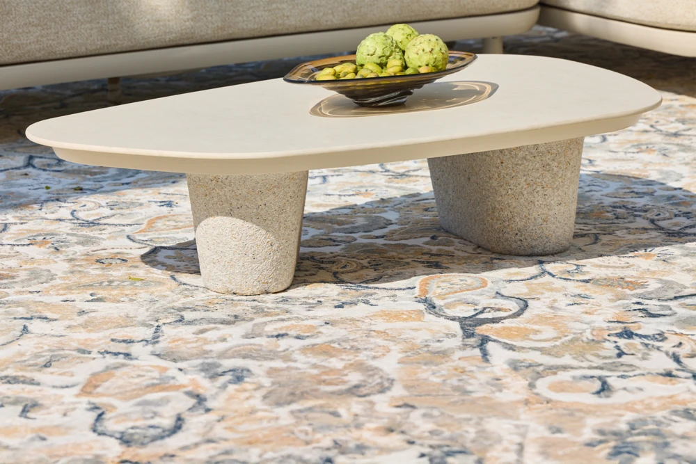 PURO coffee table with smooth stone top and sculpted base for a bold, contemporary look. Outdoor coffee tables available at Bradfords in Auckland New Zealand