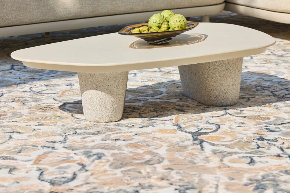 PURO coffee table with smooth stone top and sculpted base for a bold, contemporary look. Outdoor coffee tables available at Bradfords in Auckland New Zealand