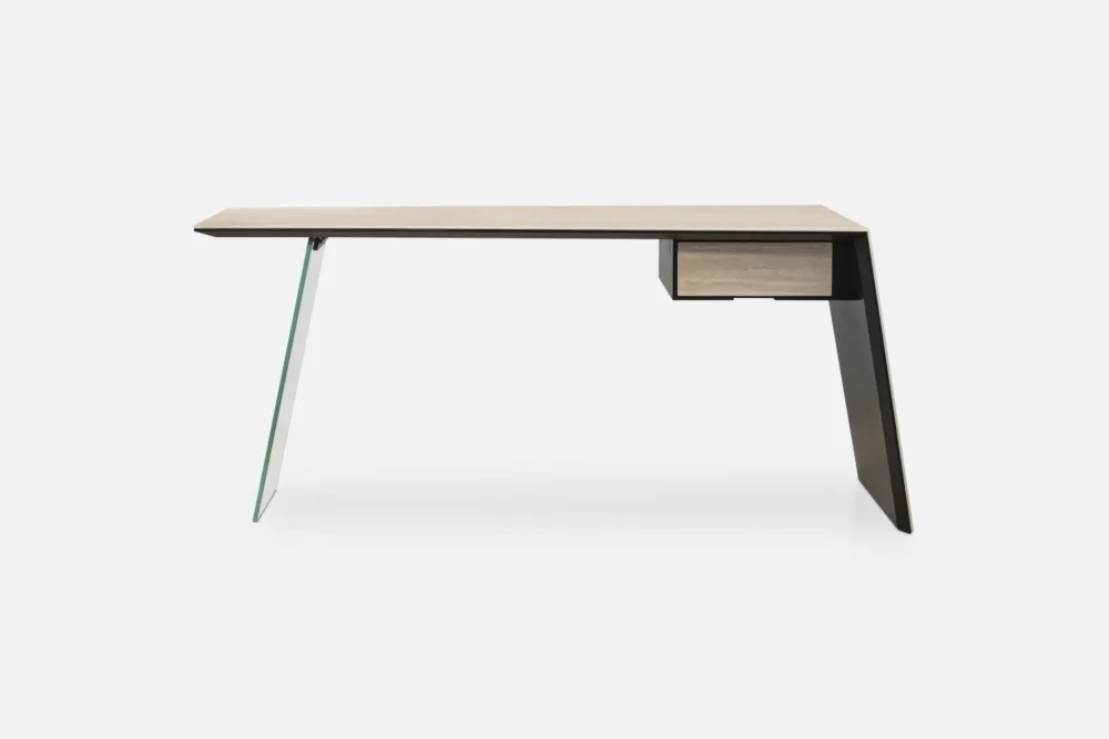 Shop the NICOLA Desk by Oliver B at Bradfords Interiors NZ. Italian designer desk with ceramic top, glass leg, and travertine drawer — contemporary style for modern homes.
