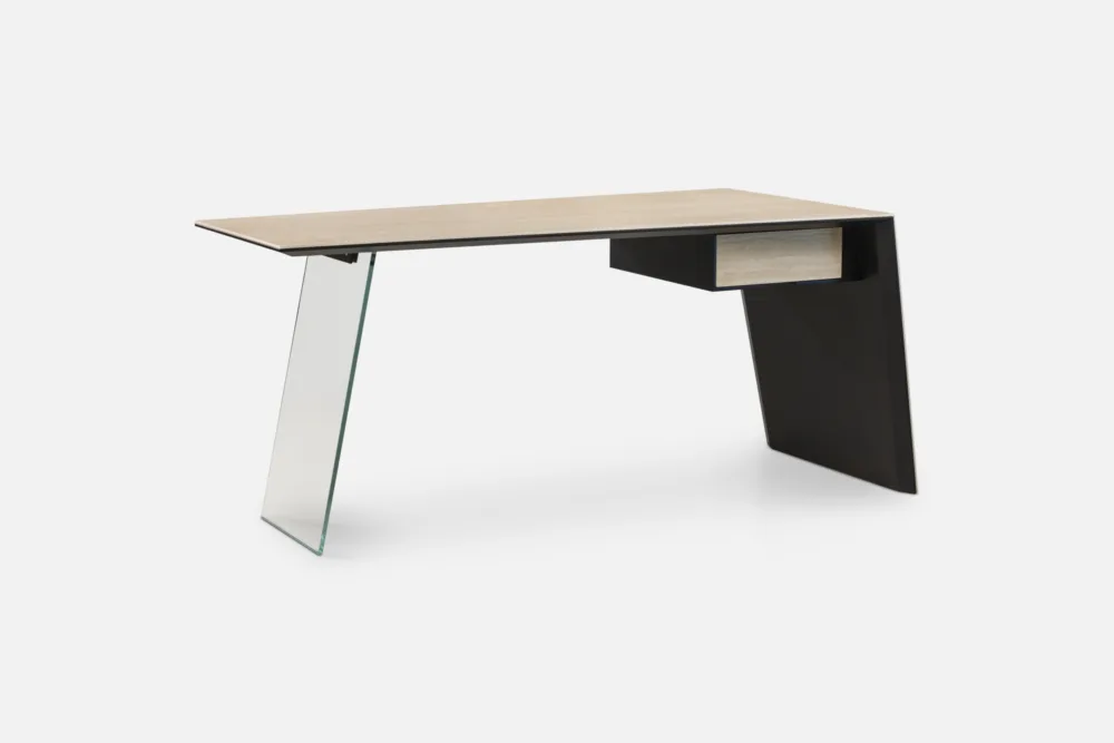 Shop the NICOLA Desk by Oliver B at Bradfords Interiors NZ. Italian designer desk with ceramic top, glass leg, and travertine drawer — contemporary style for modern homes.
