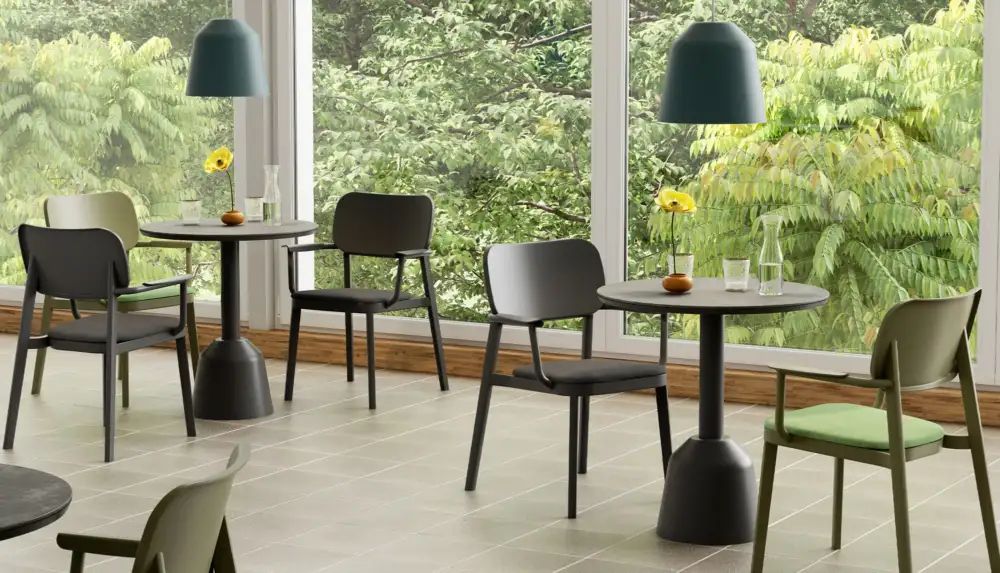 Balcon side table in black with a sculptural pedestal base and rounded ceramic top, available at Bradfords Interiors. A modern accent piece for contemporary New Zealand homes