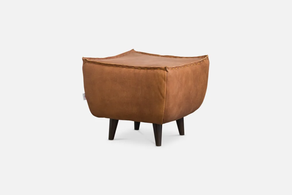 BORGIA footstool with stitched leather detail and tapered wooden legs, available at Bradfords Interior