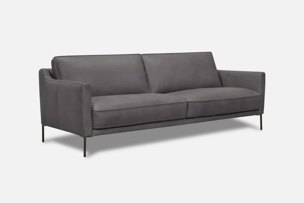 Luxurious leather sofa, combining timeless elegance with exceptional comfort. Explore our leather sofa collection at Bradfords, Auckland, New Zealand.

Compact yet cosy two-seater sofa, ideal for smaller living spaces or creating intimate seating arrangements. Find your perfect two-seater sofa at Bradfords, Auckland, New Zealand.

Sleek grey sofa, offering a modern and versatile option for your living room decor. Explore our grey sofa collection at Bradfords, Auckland, New Zealand.