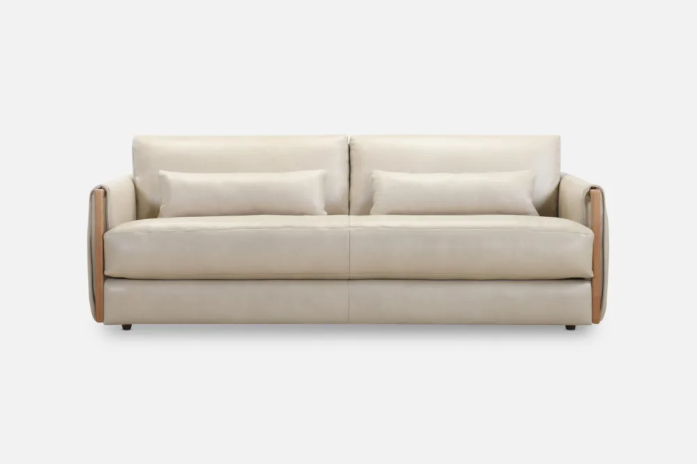 Discover the ASPEN 3-Seater Sofa at Bradfords. Upholstered in luxurious sand leather with sculpted timber detailing, ASPEN balances soft comfort with refined structure. In stock now in leather, with custom fabric options available.